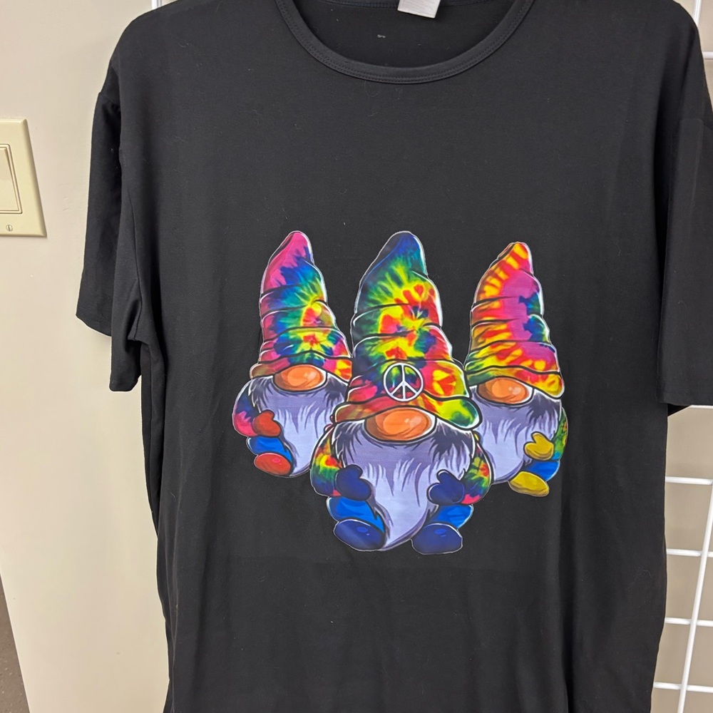 NWOT Black tie-dye gnome tee size 4XL. Short sleeve. No material info. MORE2READ
